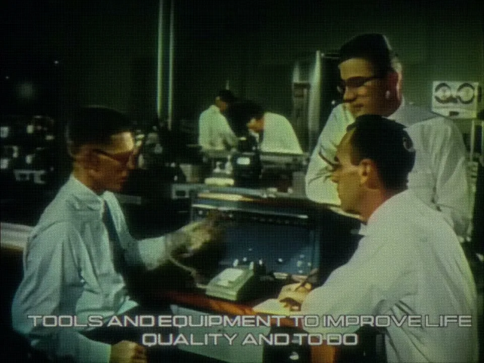 Technicians working at laboratory equipment